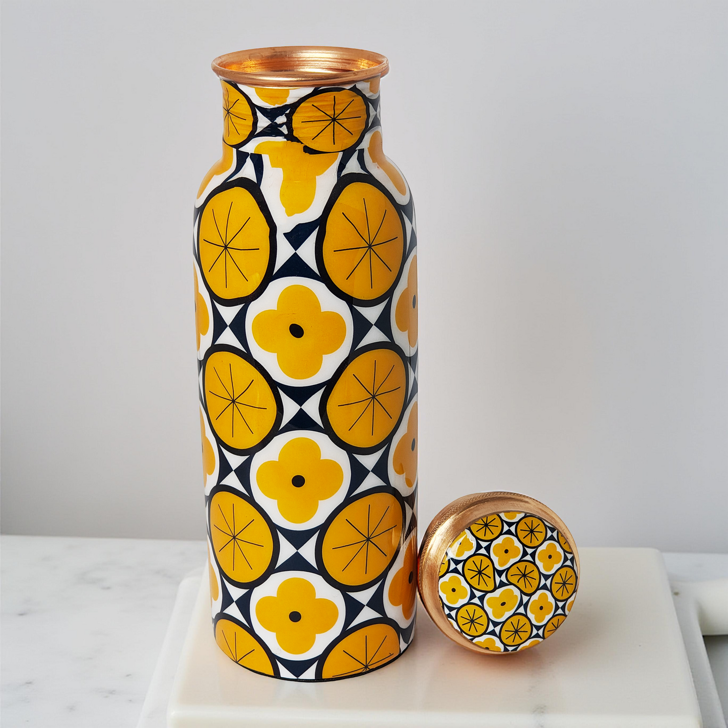 Geometric Yellow Copper Water Bottle – 1 Litre | Modern Ayurvedic Wellness Bottle